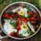 Fried eggs with black beans and sardines