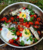 Fried eggs with black beans and sardines