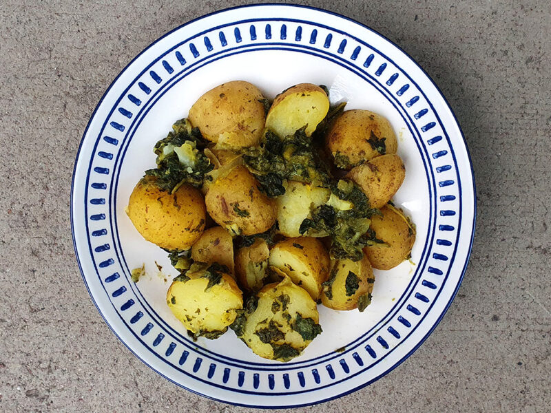 New potatoes with mustard and spinach