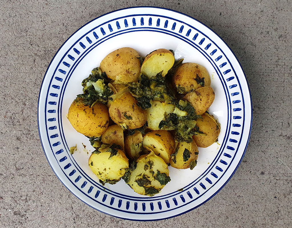 New potatoes with mustard and spinach