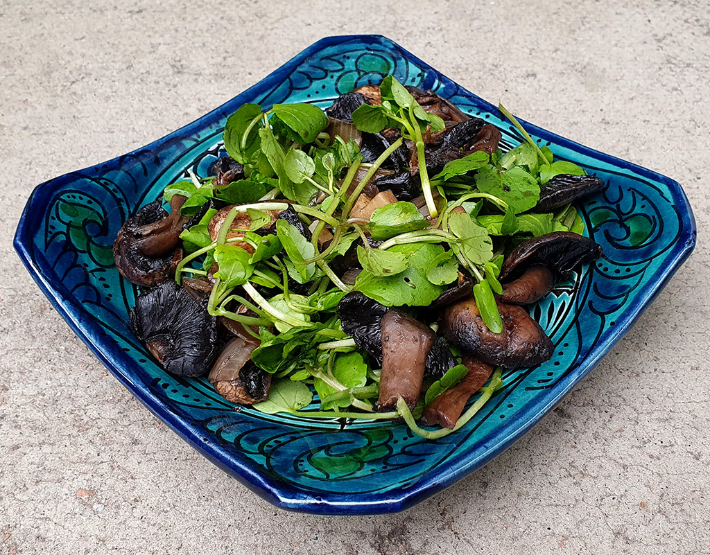 Sautéed mushroom with watercress