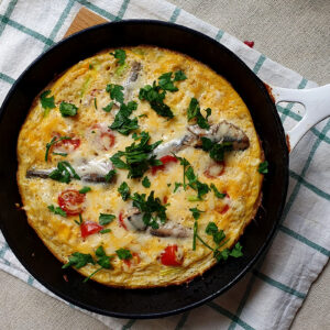 Omelette with sardines and tomatoes