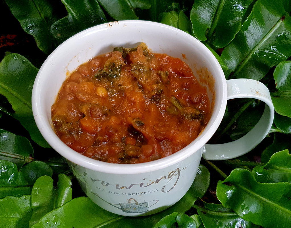 Root vegetable soup with lentils and kale