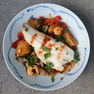 Vegetable stew with sea bass