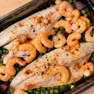 Baked Sea Bass with Prawns and Peas