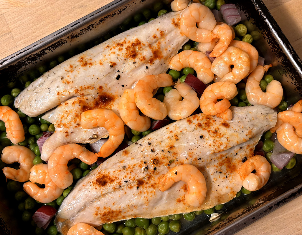 Baked Sea Bass with Prawns and Peas